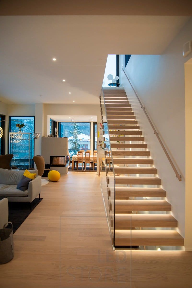 Staircase with LED strips milled into the steps to accentuate the airy and beautiful staircase